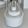 Multi-tiered curved LED-lit jewelry island table with glossy finish for retail boutiques