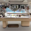Custom Long Curved Two-Tier Cosmetic Display Counter | LED Beauty Showcase