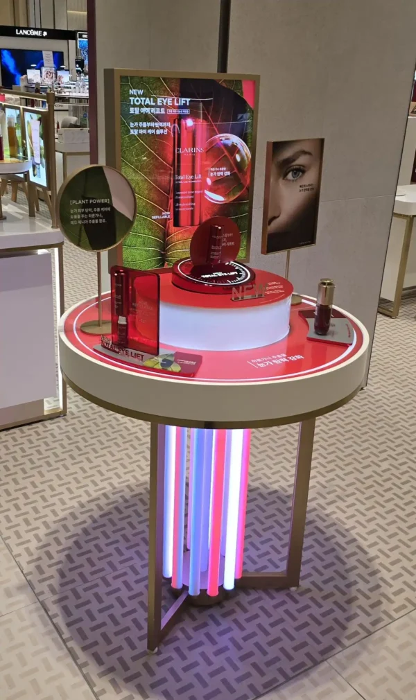 round perfume island table