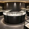 Curved Black Semi-Circular Jewelry Display Showcase with Lockable Storage | Freestanding Glass Retail Display Counter for Luxury Jewelry Stores