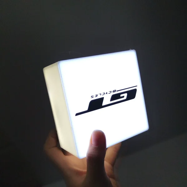 Outdoor illuminated logo of the store