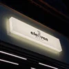 Outdoor illuminated logo of the store