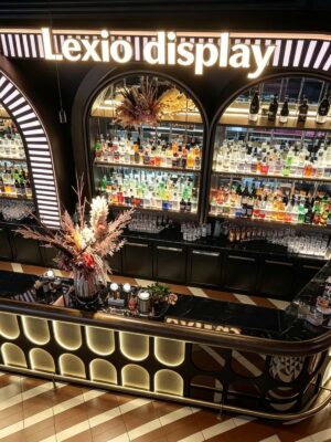 custom shop bar counter-3d design-lexio display (18) art deco illuminated curved bar counter with oval backlit panels and arched wine shelving for cocktail lounge speakeasy