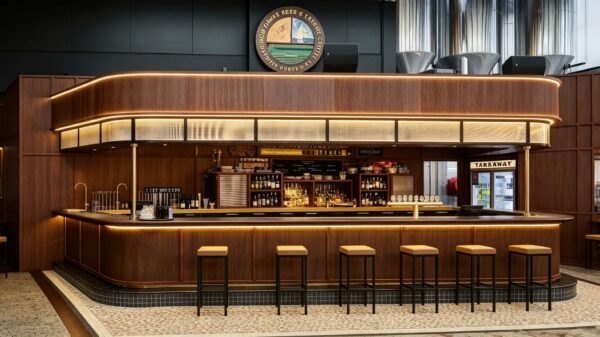 retro walnut wood curved craft beer bar counter with suspended light canopy for brewpub and gastropub