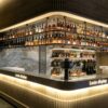 custom shop bar counter-3d design-lexio display (27) modern luxury fluted bar counter with back wall wine rack dark marble top for hotel restaurant lounge