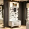 Freestanding Designer Sunglasses Display Tower | Backlit Vertical Eyewear Display Stand With Adjustable Peg Hooks, Brand Signage Area, Digital Photo Frame & Multi-Drawer Storage Base For Boutique Optical Stores