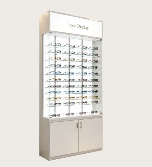 optical cabinets (20) Custom White Tall Lockable Glass Eyewear Display Case | LED Illuminated Vertical Optical Frame Showcase With Bottom Storage Cabinet & Top Backlit Logo Panel For Optician Shops