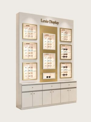 optical cabinets (23) Luxury White & Gold Wall Mounted Eyewear Display Showcase | LED Illuminated Recessed Eyeglass Display Cubbies With Brand Lettering & Drawer Storage Base For High-End Optical Boutiques
