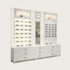 Custom Full White Modular Eyewear Wall Display System | LED Lit Multi-Style Optical Frame & Sunglasses Display Wall With Central Mirror, Large Drawer Storage Base & Decor Niche Shelves For Optical Shop Interior Design