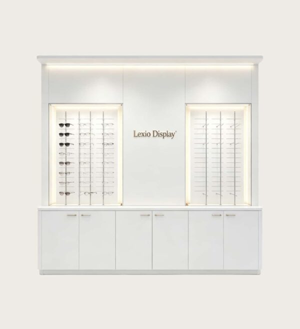 Minimalist All-White Built-In Eyewear Display Wall Unit | LED Recessed Optical Frame Display Racks With Central Brand Logo Panel & Base Storage Cabinets For Premium Optical Store Interior