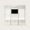 Modern Glossy White Wall Eyewear Display Wall | LED Lit Adjustable Glass Shelving Optical Display Unit With Central Digital Screen & Multi-Drawer Base Cabinets For Contemporary Optical Shop Fit-Out
