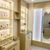 perfume display cabinet (17) Custom Light Wood Combined Multi-Function Beauty Display Wall Unit | Skincare Perfume Shelving