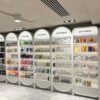 perfume display cabinet (23) Wholesale Arched White Modular Skincare Display Wall Cabinet | Beauty Shelving Unit