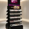 perfume gondola display (12) Black Vertical Makeup Display Stand | Commercial Tiered Cosmetic Floor Showcase For Drugstore Beauty Retail