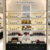 perfume gondola display (6) Custom Arch Wooden Perfume Display Wall Cabinet | Luxury Fragrance Shelving Unit With LED For Perfume Shop