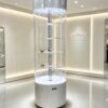 Wholesale Rotating Cylindrical Glass Jewelry Display Cabinet | LED Illuminated Round Tower Showcase with Lock & Wheels