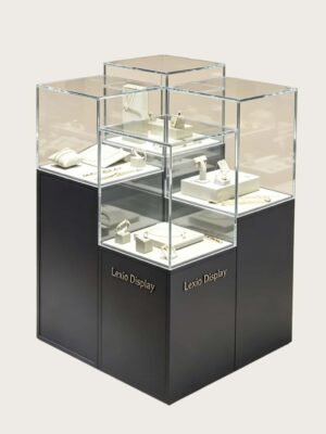 museum display cabinet (1) Staggered multi-tier frameless glass jewelry island display cabinet with matte dark base Lexio Display for luxury jewellery boutique retail