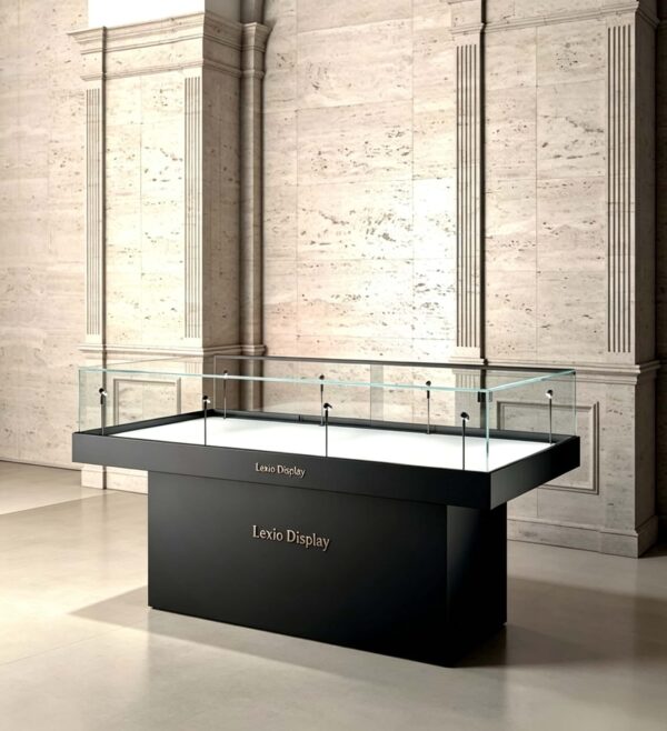 Matte black low island glass display case with white interior and built-in spotlights Lexio Display for museum artifacts, jewelry and luxury goods exhibition