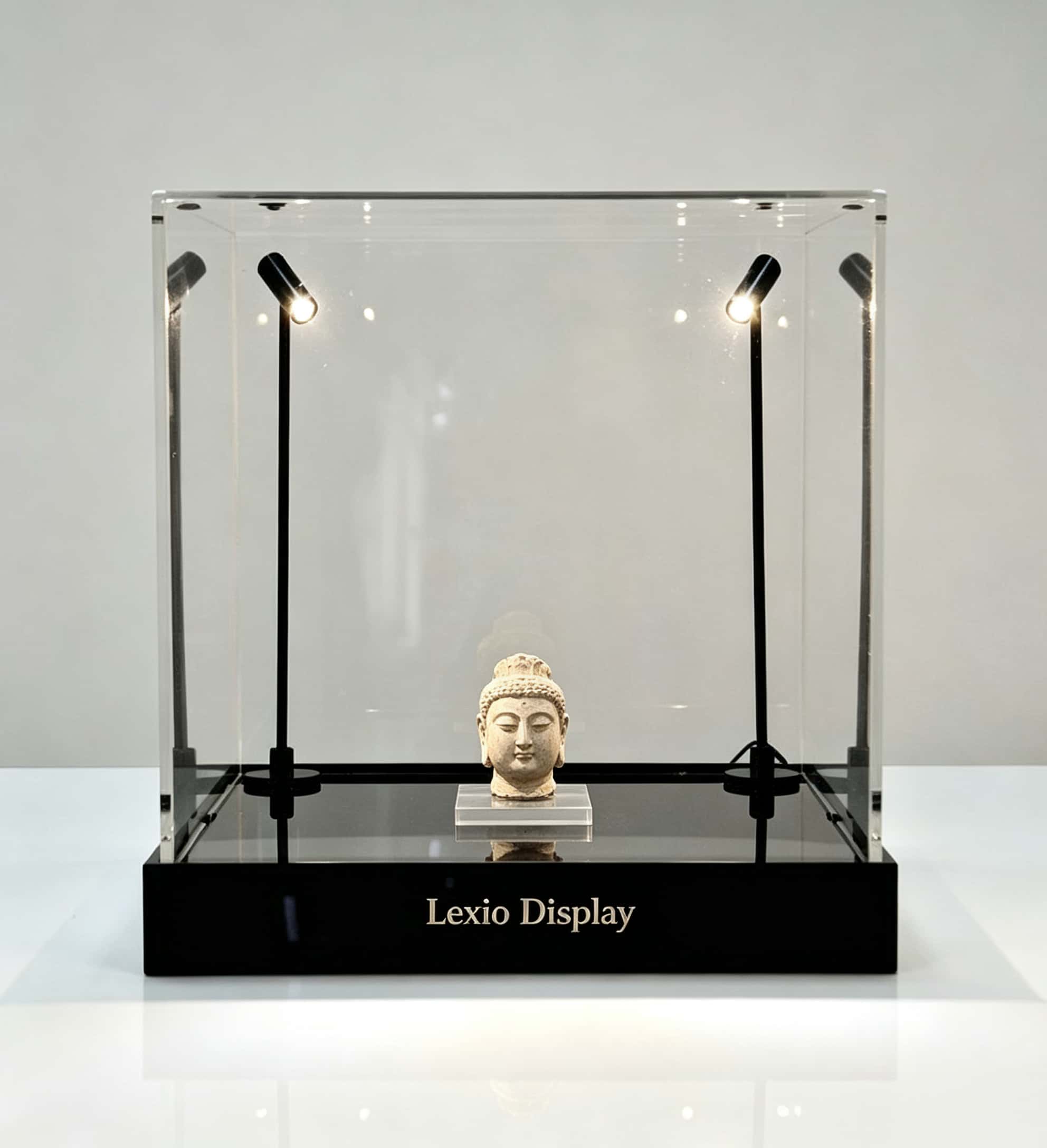 Square clear acrylic display box with adjustable upright LED spotlights and gloss black base Lexio Display for sculpture, antiques and collectibles exhibition