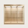 museum display cabinet (2) Light beige triple-bay wall museum glass display case with independent compartments and top panel LED lighting Lexio Display for sculpture and antiquities exhibition