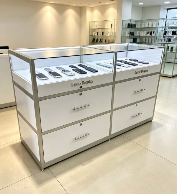 phone display cabinet (3) White dual compartment glass mobile phone island display counter with LED light and lockable drawers Lexio Display
