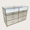 phone display cabinet (4) White dual compartment glass mobile phone island display counter with LED light and lockable drawers Lexio Display