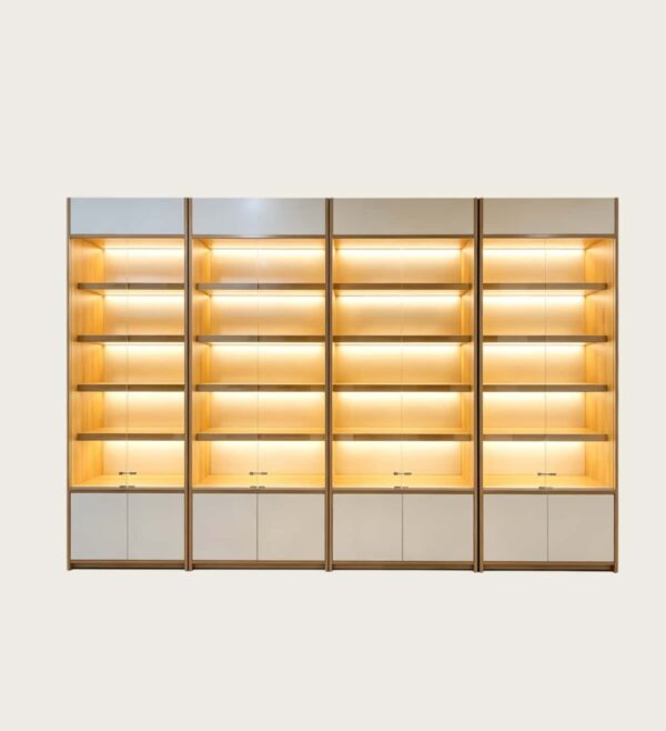 Modular combined wood frame tall LED backlit wall display cabinet with white storage base Lexio Display