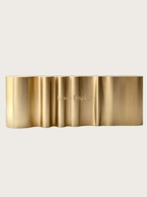 Custom vertical fluted ribbed brushed gold reception desk long wavy lobby front counter Lexio Display