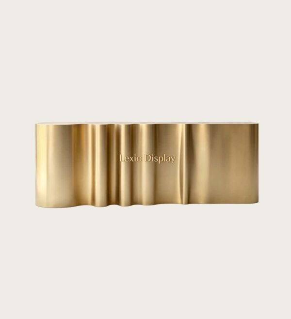 Custom vertical fluted ribbed brushed gold reception desk long wavy lobby front counter Lexio Display