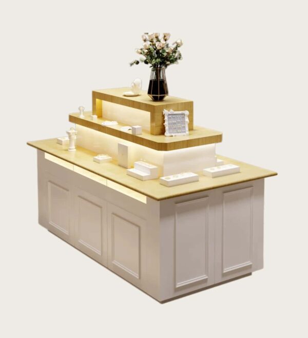 Tiered wooden top pink white jewelry island display counter with LED light Lexio Display retail showcase for jewelry boutique clothing store