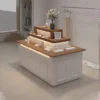Tiered wooden top pink white jewelry island display counter with LED light Lexio Display retail showcase for jewelry boutique clothing store