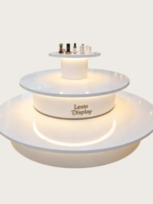 retail display stands (1) Gloss pure white three-tier circular tiered LED lighted retail island display table Lexio Display for cosmetic boutique and shopping mall pop-up showcase