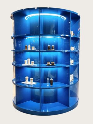 retail display stands (1) Glossy blue cylindrical grid display cabinet with multi-tier curved shelves and built-in LED lighting Lexio Display for café beverage mall retail showcase