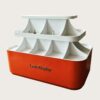 retail display stands (12) Orange white glossy two-tier curved sector divided island display cabinet with clear glass Lexio Display for café bakery beverage retail mall showcase