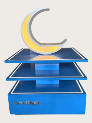 Blue three-tier LED edge lighted retail island display stand with illuminated crescent decor Lexio Display for shopping mall pop-up and product promotion