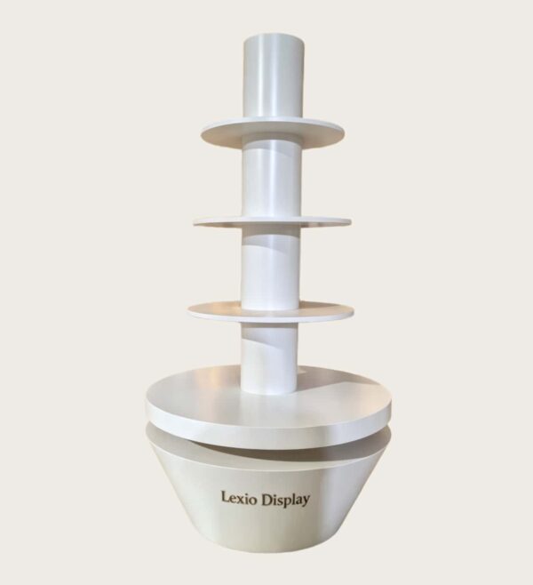 Minimalist all white four-tier cylindrical column retail display stand tapered base Lexio Display for retail store and mall pop-up product promotion
