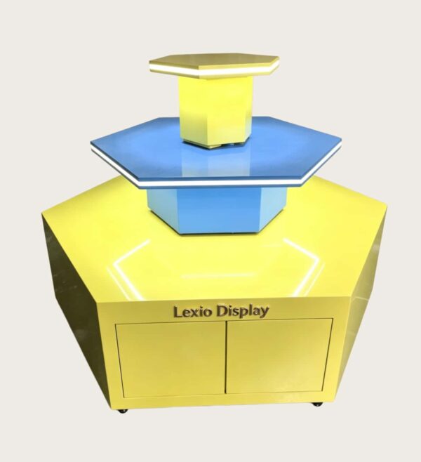 retail display stands (4) Hexagonal three-tier LED edge lighted island display stand glossy yellow blue with storage cabinet Lexio Display for shopping mall pop-up and product promotion