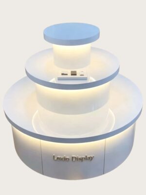 retail display stands (8) Light blue white three-tier cylindrical LED glowing retail island display stand Lexio Display for electronics cosmetic boutique and mall pop-up showcase
