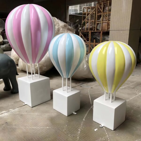 Fiberglass striped pastel hot air balloon sculptures with white square plinth bases Lexio Display for shopping mall, wedding, event photo prop decoration