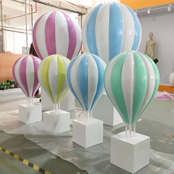 Fiberglass striped pastel hot air balloon sculptures with white square plinth bases Lexio Display for shopping mall, wedding, event photo prop decoration