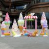 Pastel macaron fiberglass ice cream cone and cake sculpture set with striped awning photo frame Lexio Display for outdoor shopping mall candy theme decoration