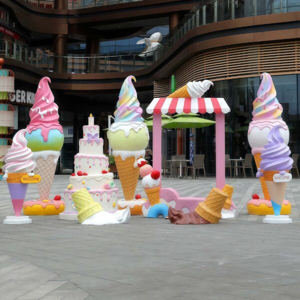 Pastel macaron fiberglass ice cream cone and cake sculpture set with striped awning photo frame Lexio Display for outdoor shopping mall candy theme decoration