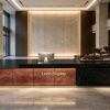 Tiered luxury reception desk with black marble top and etched patina copper art panel, LED illuminated corporate lobby front counter Lexio Display for premium commercial interior