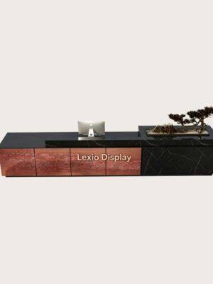 Tiered luxury reception desk with black marble top and etched patina copper art panel, LED illuminated corporate lobby front counter Lexio Display for premium commercial interior