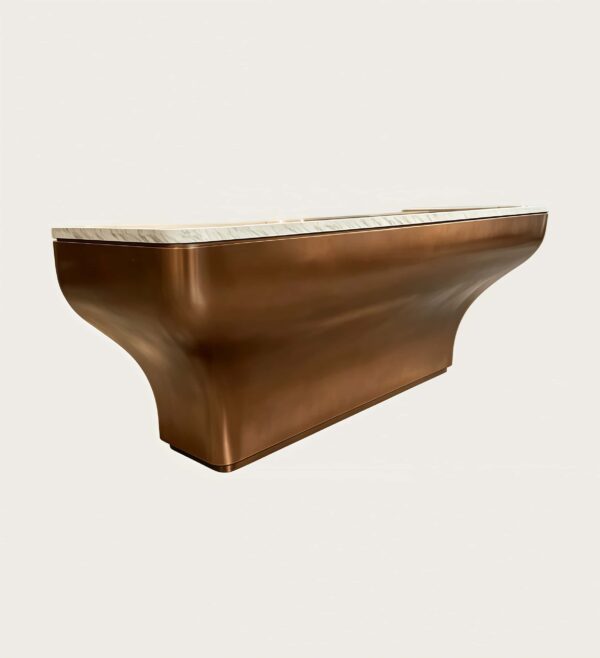 Brushed bronze curved reception desk with natural marble top, solid‑body luxury lobby counter Lexio Display for premium hotel and corporate project