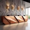 reception desk (27) Faceted geometric rose‑gold reception desk with ambient LED backlight, multi‑person lobby counter Lexio Display for modern luxury commercial interior