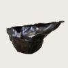 Sculptural fluid crumpled‑form abstract art reception desk, metallic lobby front counter Lexio Display for gallery and high‑end commercial interior