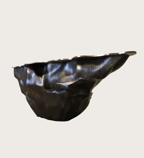 Sculptural fluid crumpled‑form abstract art reception desk, metallic lobby front counter Lexio Display for gallery and high‑end commercial interior