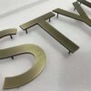 Mixed finish 3D stainless steel numbers, gold, silver and bronze solid metal digits