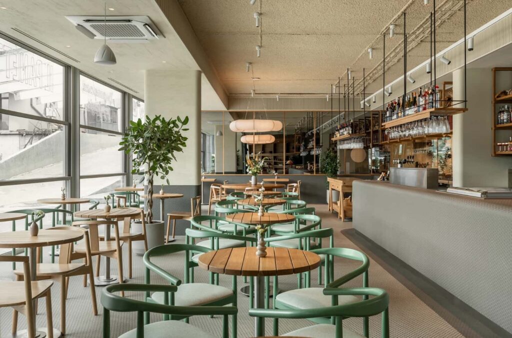 Minimalist Restaurant Interior With Bespoke Timber Display Shelving